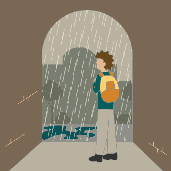 person standing under an arch watching the rain